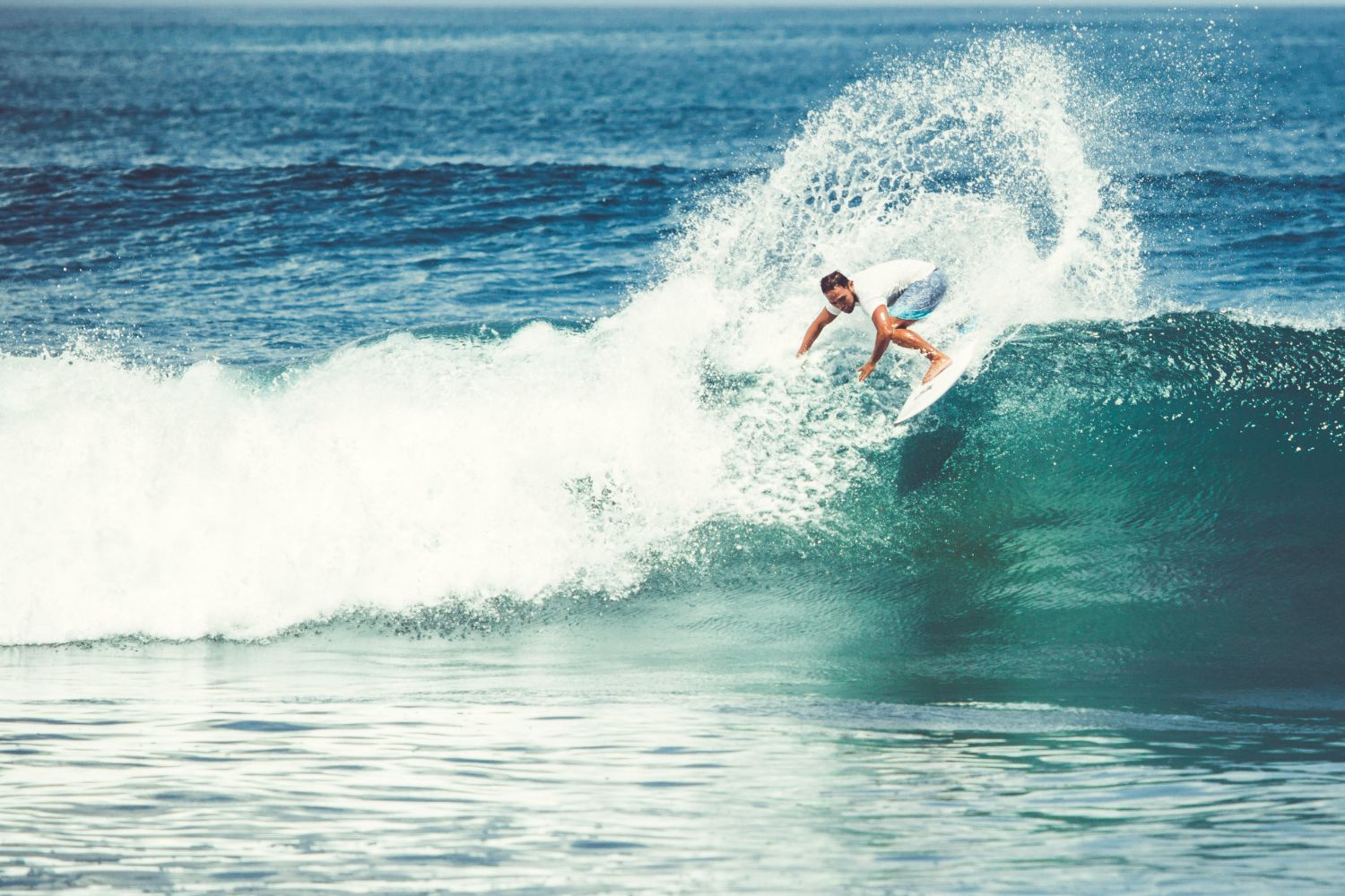 Photo of surfer to illustrate remote asset maritime management