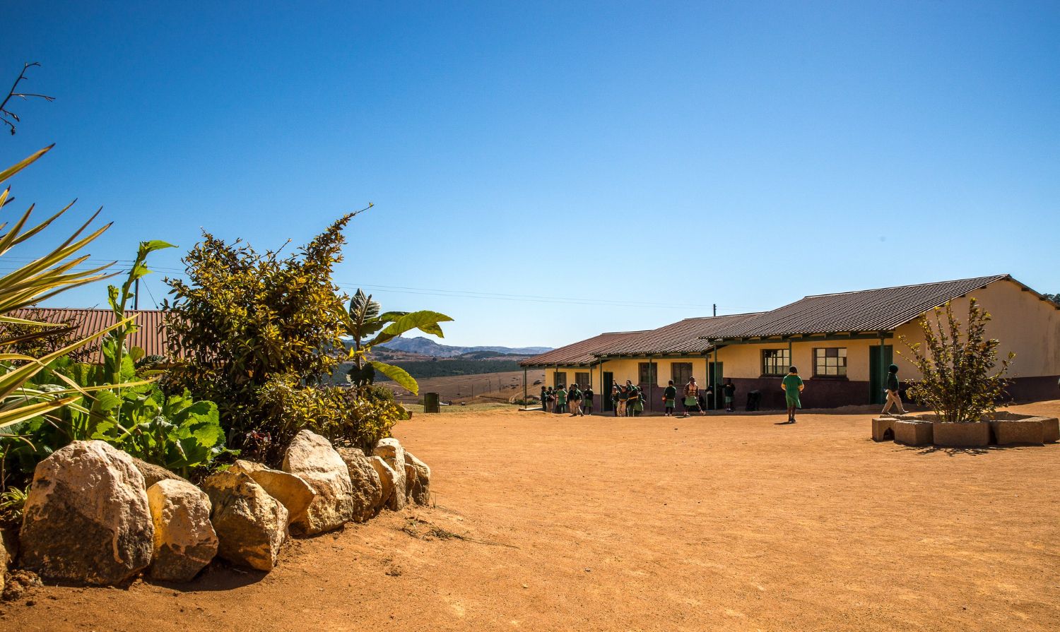 Photo of a remote school building in the desert to illustrate a blog on how satellite internet broadband can help with connectivity 
